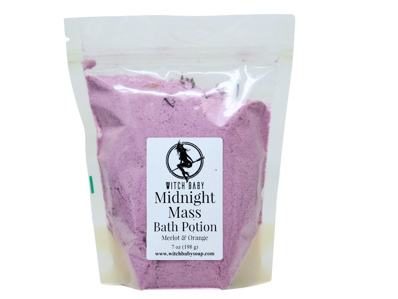 Purple bath potion in a clear bag with a label on a white background