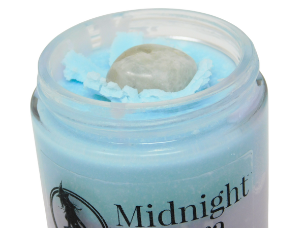 top view of midnight aura body butter highlighting the moonstone on top
